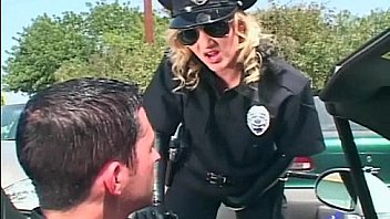 Female officer fucking in shiny latex lingerie Female officer fucking in shiny latex lingerie