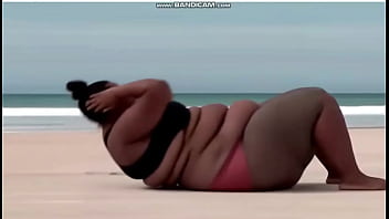 Very fat big titted black woman exercises on beach solo ai generated vb12a Very fat big titted black woman exercises on beach solo ai generated vb12a