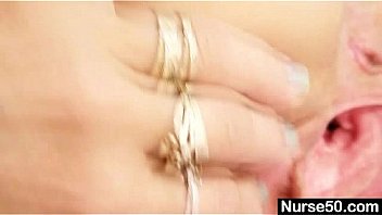 Skinny milf senior nurse toys her pussy on gynochair