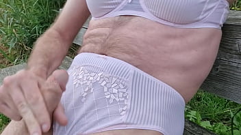 Man wearing lingerie in the park and masturbates in it Man wearing lingerie in the park and masturbates in it