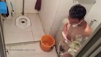 Chinese adult man bathing Chinese adult man bathing