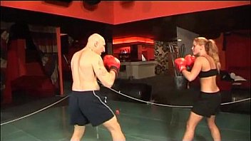 Hot boxer girl gives a blow job in the ring