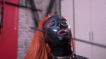 Do you love latex watch how the latex doll worships mistress's legs kisses them and sucks heels but receives only slaps and spit from dominatrix nika