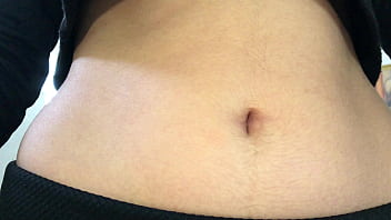 Oval shaped navel close up and looking inside her navel Oval shaped navel close up and looking inside her navel