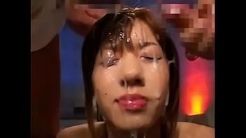Japanese slut gets covered with cum from two guys