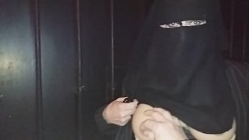 Big boobs in niqab in the street