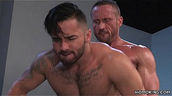 Pumped men having lusty gay sex