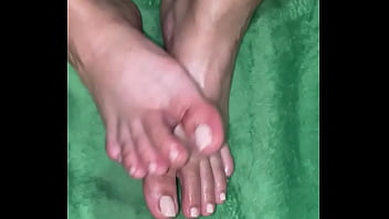 Oiled up toes and soles Oiled up toes and soles