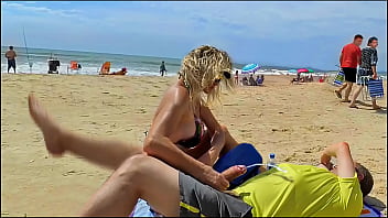 Milf makes stranger ejaculate with skillful handjob right on the beach Milf makes stranger ejaculate with skillful handjob right on the beach
