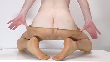Posing and stripping off tan tights Posing and stripping off tan tights