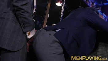 Men in suits fuck after arguing at a bar Men in suits fuck after arguing at a bar