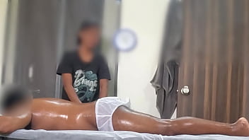 Asian spa girl massaging boy Asian spa girl massaging boy