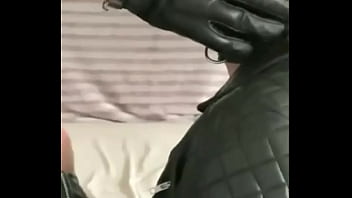 Leather clad & blindfolded sub used by black muscle Leather clad & blindfolded sub used by black muscle