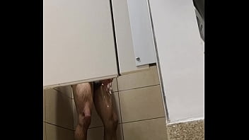 Man wanking after workout in gym Man wanking after workout in gym