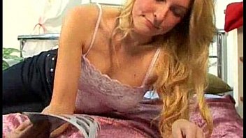 Blonde masturbates with purple vibrator