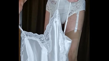 Crossdresser wearing garterbelt and bra and jerking off in it