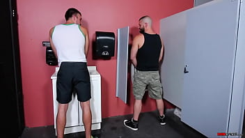 Two muscular guys sucking and fucking in the bathroom stall Two muscular guys sucking and fucking in the bathroom stall