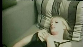 Sexy blonde lady in black lingerie masturbating Sexy blonde lady in black lingerie masturbating