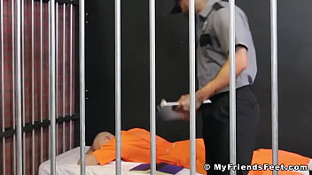 Prison inmate licks toes for hunky guard Prison inmate licks toes for hunky guard