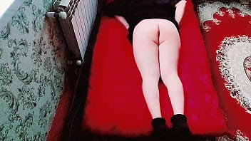 Playful femboy resting head on soft pink pillow Playful femboy resting head on soft pink pillow