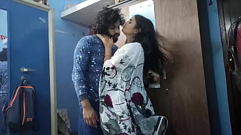 Desi couple share sweet kisses and gentle touches while standing Desi couple share sweet kisses and gentle touches while standing