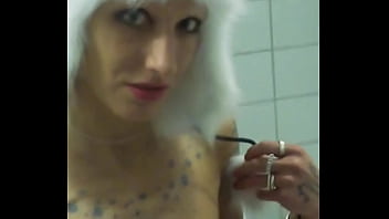 Vilja’s panda hat hides nothing as she fingers her dripping pussy fishnet stretched tight pulling out saggy tits while craving a hard dick