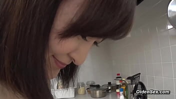 Naked busty asian mature lady suzune yagami naked with red leather collar cooks in the kitchen then moves in bedroom and sucks and fucks