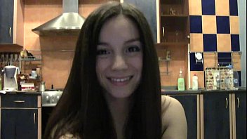 Naughty brunette with a banana on webcam