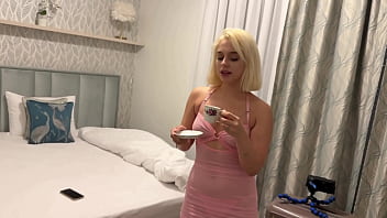 Flexible blonde cheerleader with her friend wears a transparent pink dress with a thong which does not cover pussy or ass