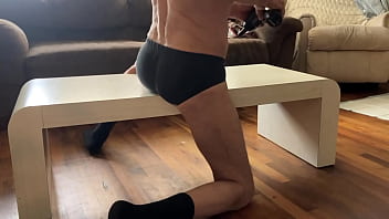 Preview of agressive myofascial pressure and release stretching on table in underwear with percussion massager