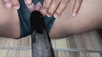 Enormous natural tits spilling out of a tight bikini top sucking this big fat cock and getting covered