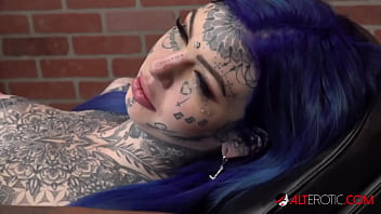 Busty inked up alt chick gets some new ink at the tattoo shop