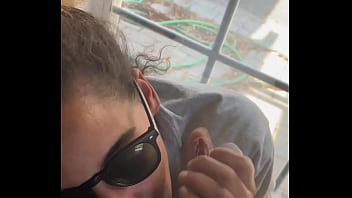 Lightskin ebony slut little step-sister giving blowjob in front of window gets cum on her face while her boyfriend is looking for her