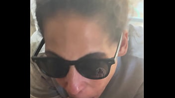 Lightskin ebony slut little step-sister giving blowjob in front of window gets cum on her face while her boyfriend is looking for her