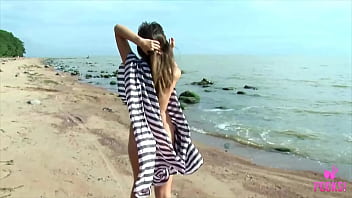 She's such a teasing tanned nymph she loves beach and pussy masturbation watch her getting tanned as she poses and strips off in the sexiest possible way at the beach