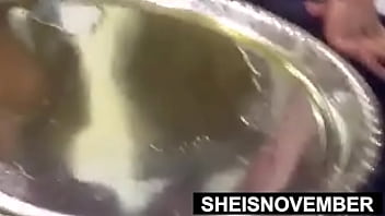 Hot fat black bimbo sheisnovember pissing standing in restroom dripping in oiled grease raunchy naked crotch with large butt squatting and voluptuous exotic boobs with hard nipples out pose closeup erotica by msnovember