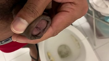 Brown guy masturbating in bathroom