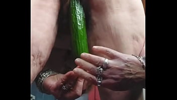 Granny fucks hairy pussy with cucumber