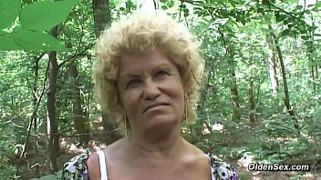 Curly blonde haired hungarian granny francsina meets stranger gabor in the woods in the middle of the day and strips for him then sucks and fucks