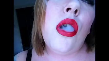 British domme in pvc smoking a gauloise cigarette