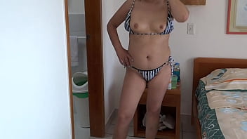 Beautiful stepmother on the beach very excited shows off and starts touching herself she needs to fuck