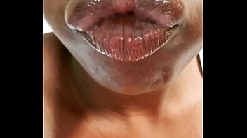 Ebony glossy lips on display