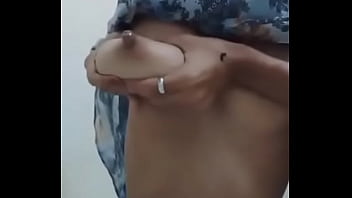 heavily pregnant milking tits