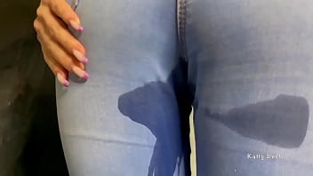 teen peeing in jeans