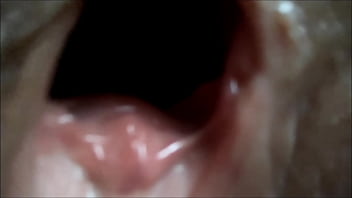 lesbian sticks tongue deep inside pussy close up