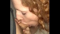 Curly redhead sucks passionately