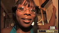 Ebony takes a facial in a club bukkake party 14