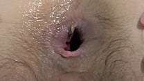 Anal penetration with different sex toys. Brunette with hairy holes on bed.