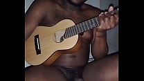 Translating other meanings of horns in the air while singing and playing guitar naked