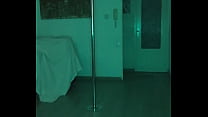 Amateur opens the bar, dances and strips naked while people watch her